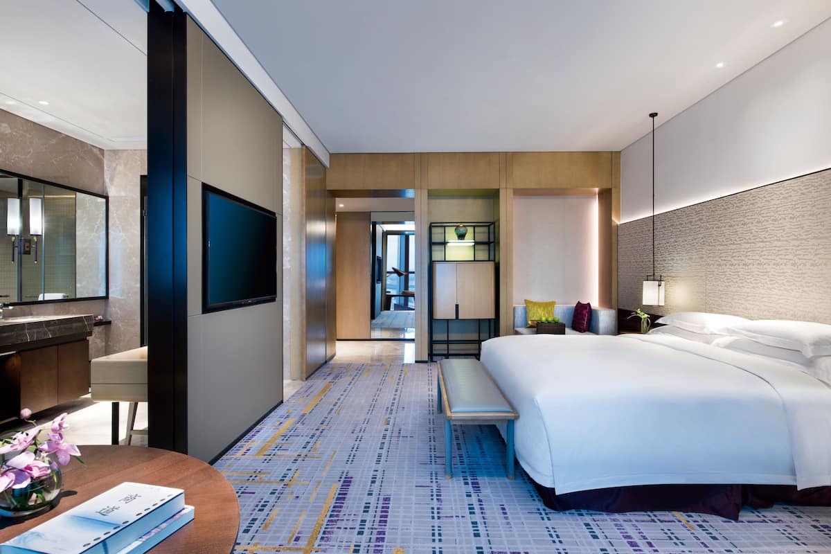 Premium bedding, down duvets, pillow-top beds, in-room safe