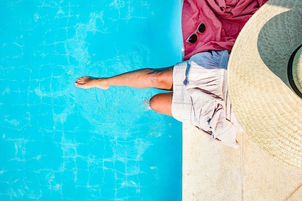 Outdoor pool, open 7:00 AM to 8:00 PM, pool umbrellas