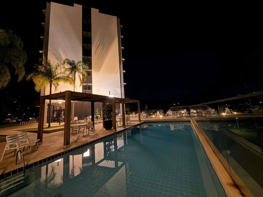 Outdoor pool, open 7:00 AM to 8:00 PM, pool umbrellas