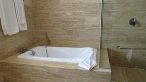 Premium Suite, 2 Bedrooms | Deep soaking bathtub
