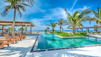 3 outdoor pools, pool umbrellas, pool loungers