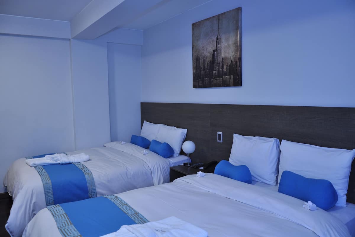 twin room | minibar, in-room safe, desk, cots/infant beds