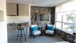 Studio 2 | Living area | 42-inch flat-screen TV with cable channels, TV