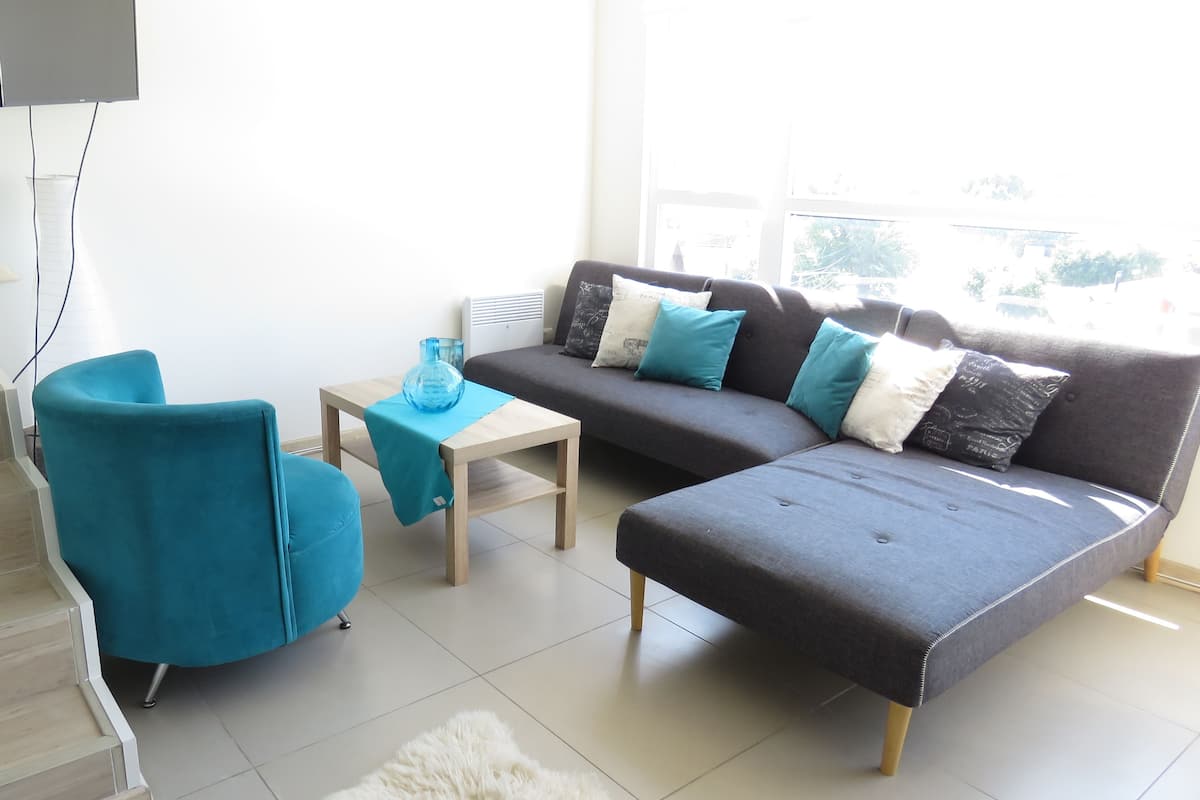 Duplex 1 | Living area | 42-inch flat-screen TV with cable channels, TV