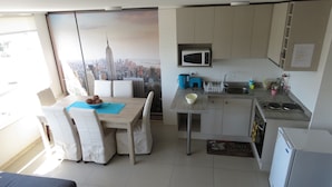 Apartment | Living area | 42-inch flat-screen TV with cable channels, TV