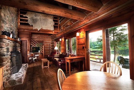 Wright Cabin 4 Bedroom, 4 Bath | Living area | 32-inch flat-screen TV with cable channels. Drummond Island Resort