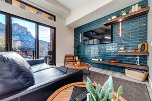 LaFave South: The Sentinel | Living area | 65-inch flat-screen TV with digital channels, TV, streaming services - LaFave: Luxury Rentals at Zion (Springdale)