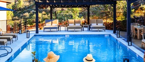 Seasonal outdoor pool, pool loungers