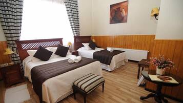 Standard Triple Room, 1 Bedroom, Private Bathroom | In-room safe, iron/ironing board, free cribs/infant beds, free WiFi