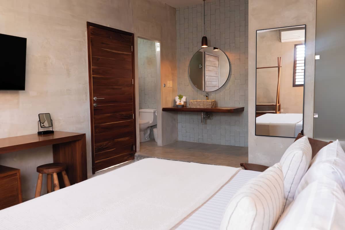 premium room, 1 king bed | premium bedding, in-room safe, desk, iron/ironing board