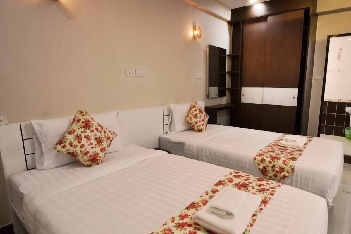 Premium bedding, in-room safe, blackout curtains, rollaway beds