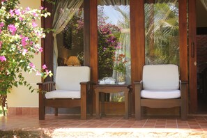 Bungalow Pool View | Minibar, in-room safe, desk, blackout curtains - Golden Peak Resort & Spa Phan Thiet (Phan Thiet)