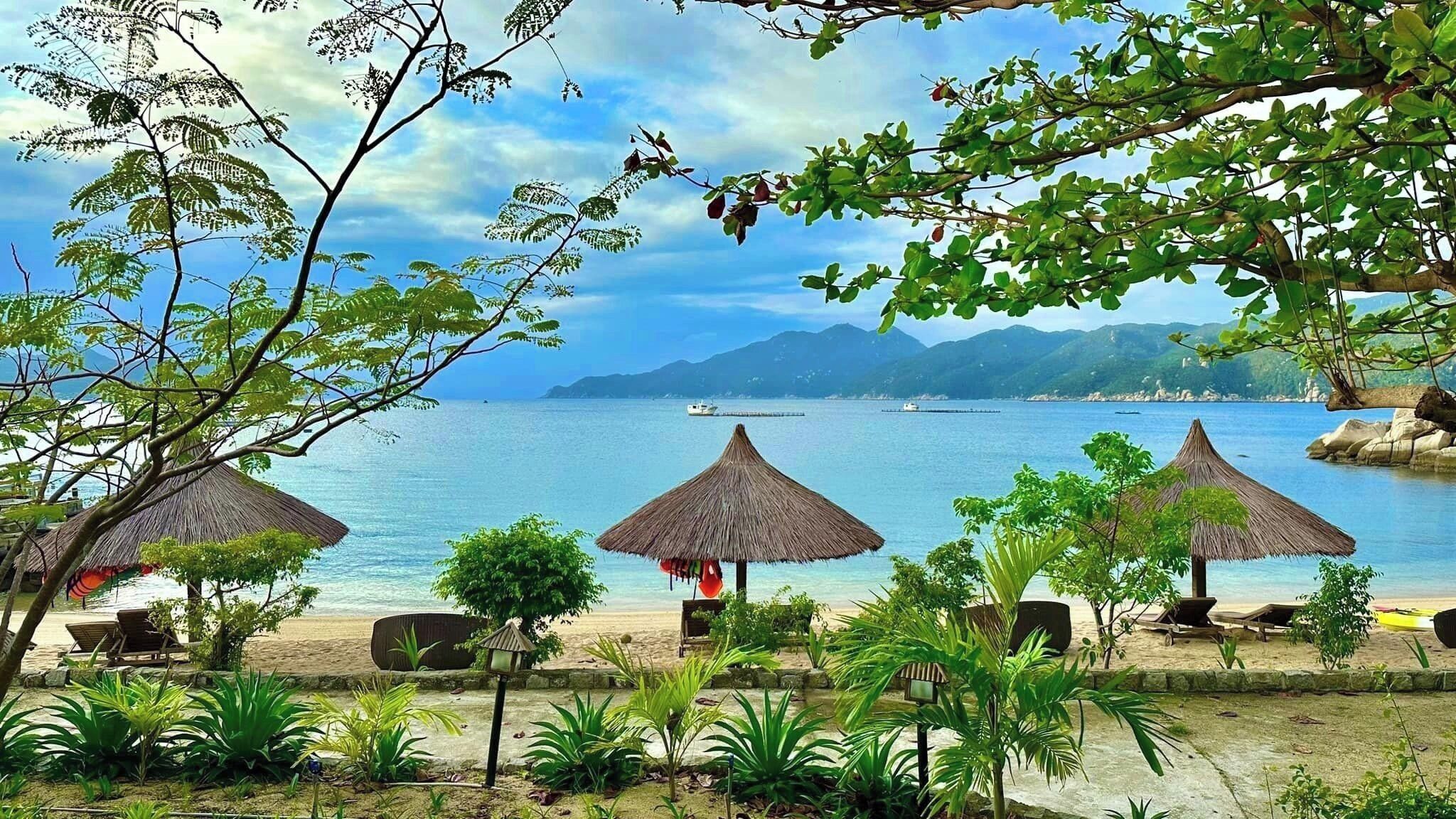 On the beach, sun-loungers, beach umbrellas, beach towels