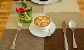 Breakfast, lunch, dinner served; local cuisine 