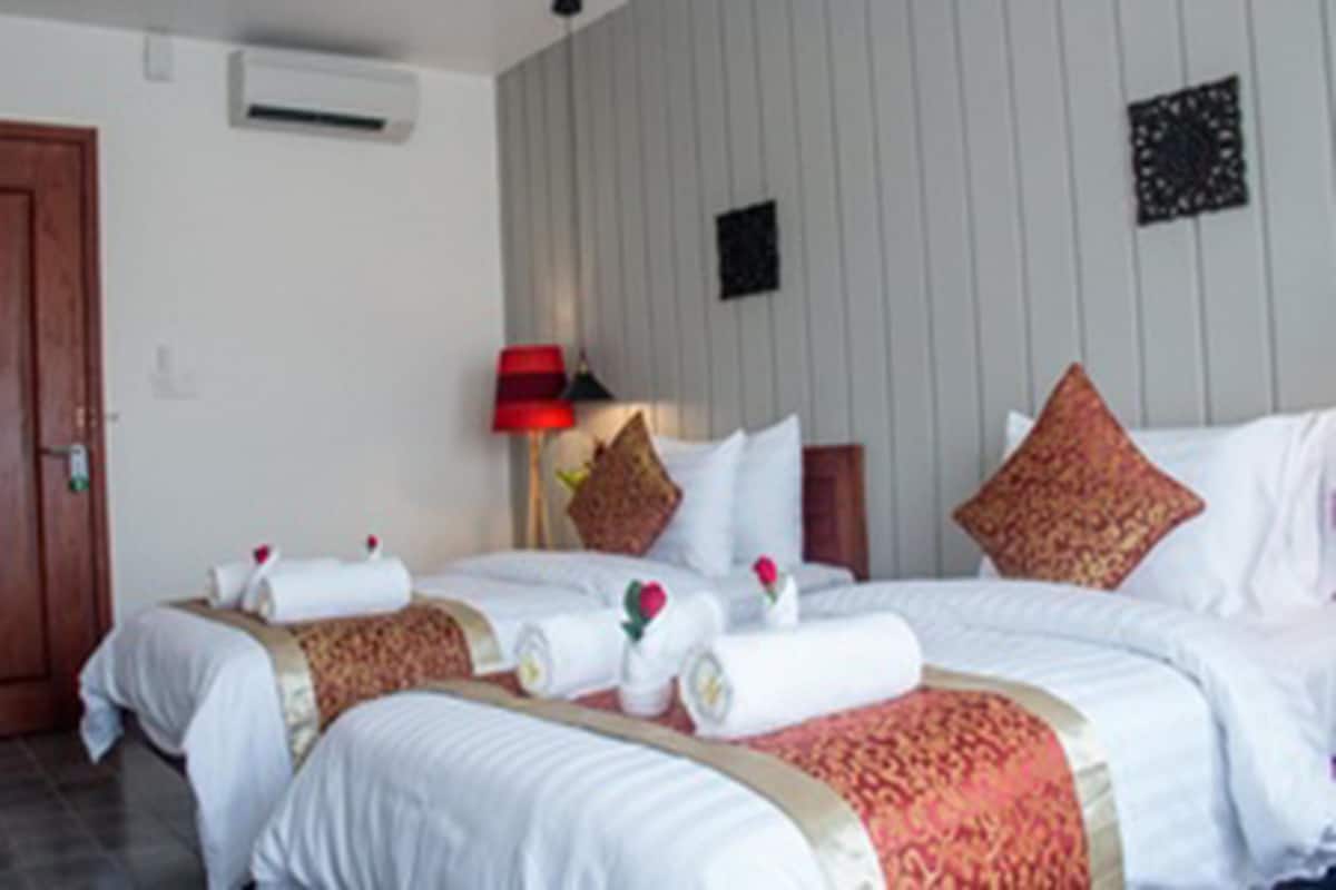 Phòng 2 giường đơn Deluxe | Minibar, bàn, truy cập Internet không dây miễn phí 