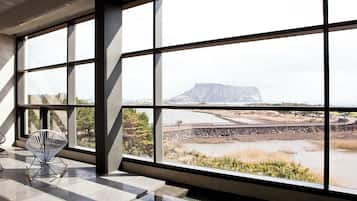 Penthouse | Premium bedding, down comforters, blackout drapes, free WiFi