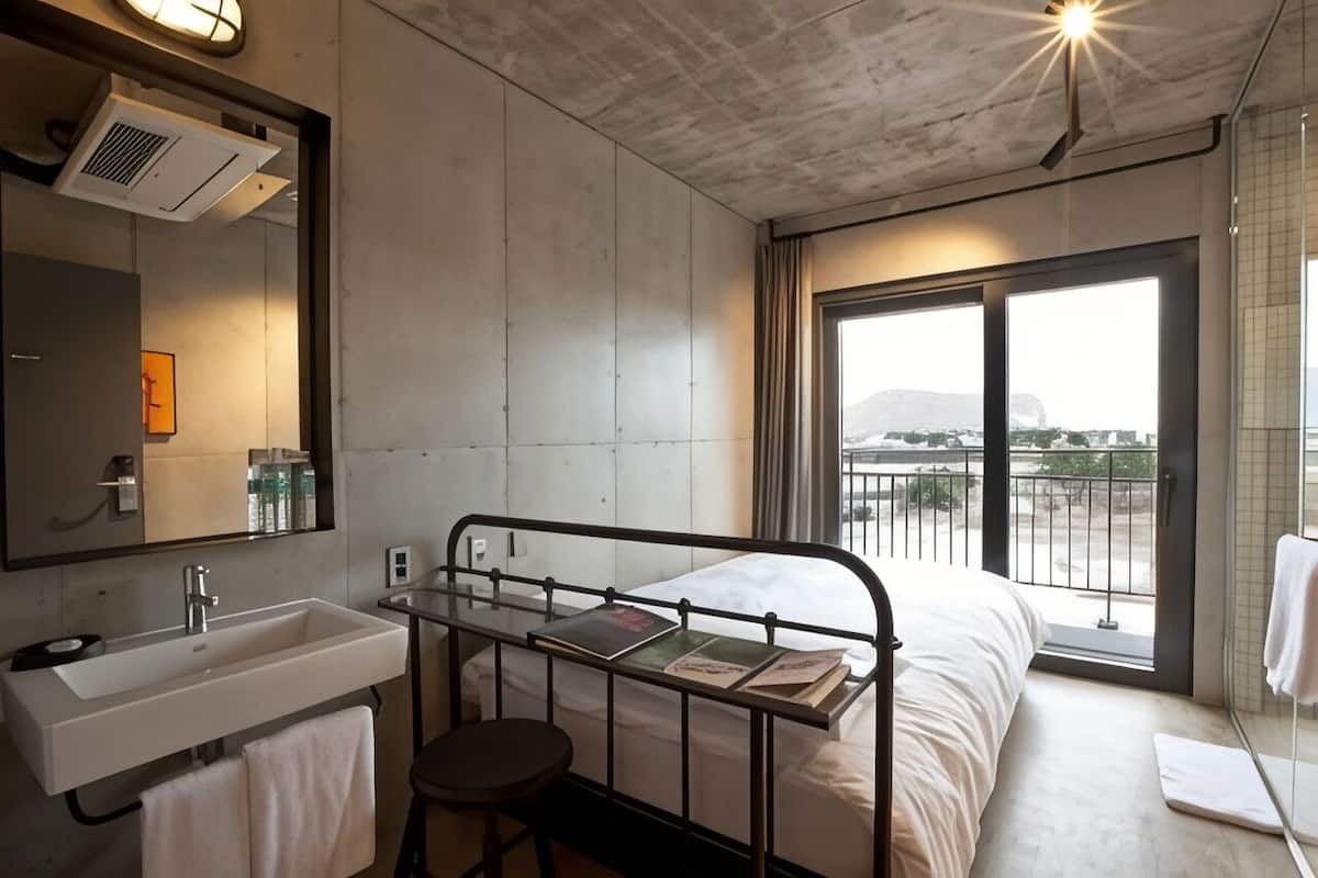 Premium bedding, down duvets, blackout curtains, free WiFi