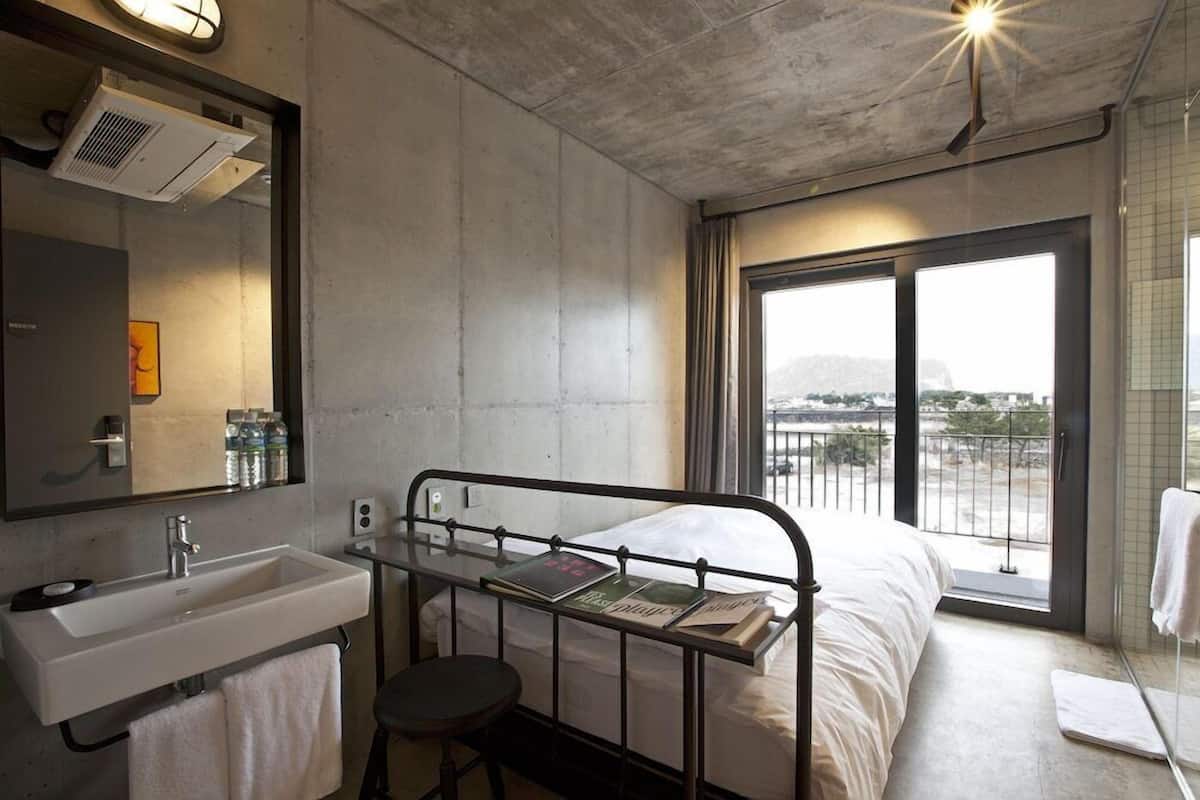 Premium bedding, down duvets, blackout curtains, free WiFi