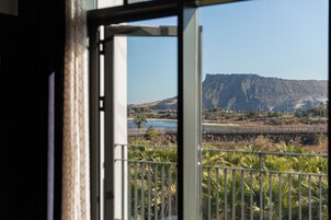 Premium bedding, down comforters, blackout drapes, free WiFi