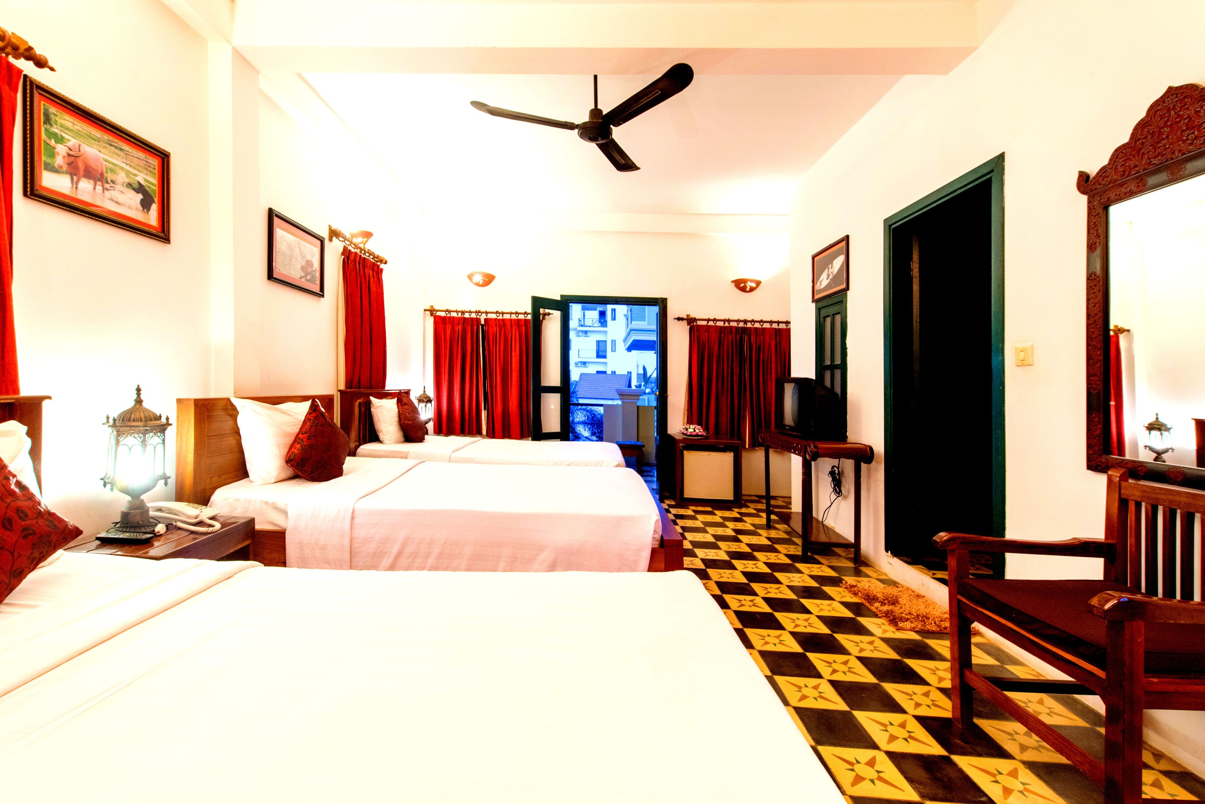 superior triple room, 1 bedroom, garden view, garden area | 1 bedroom, in-room safe, individually decorated, individually furnished