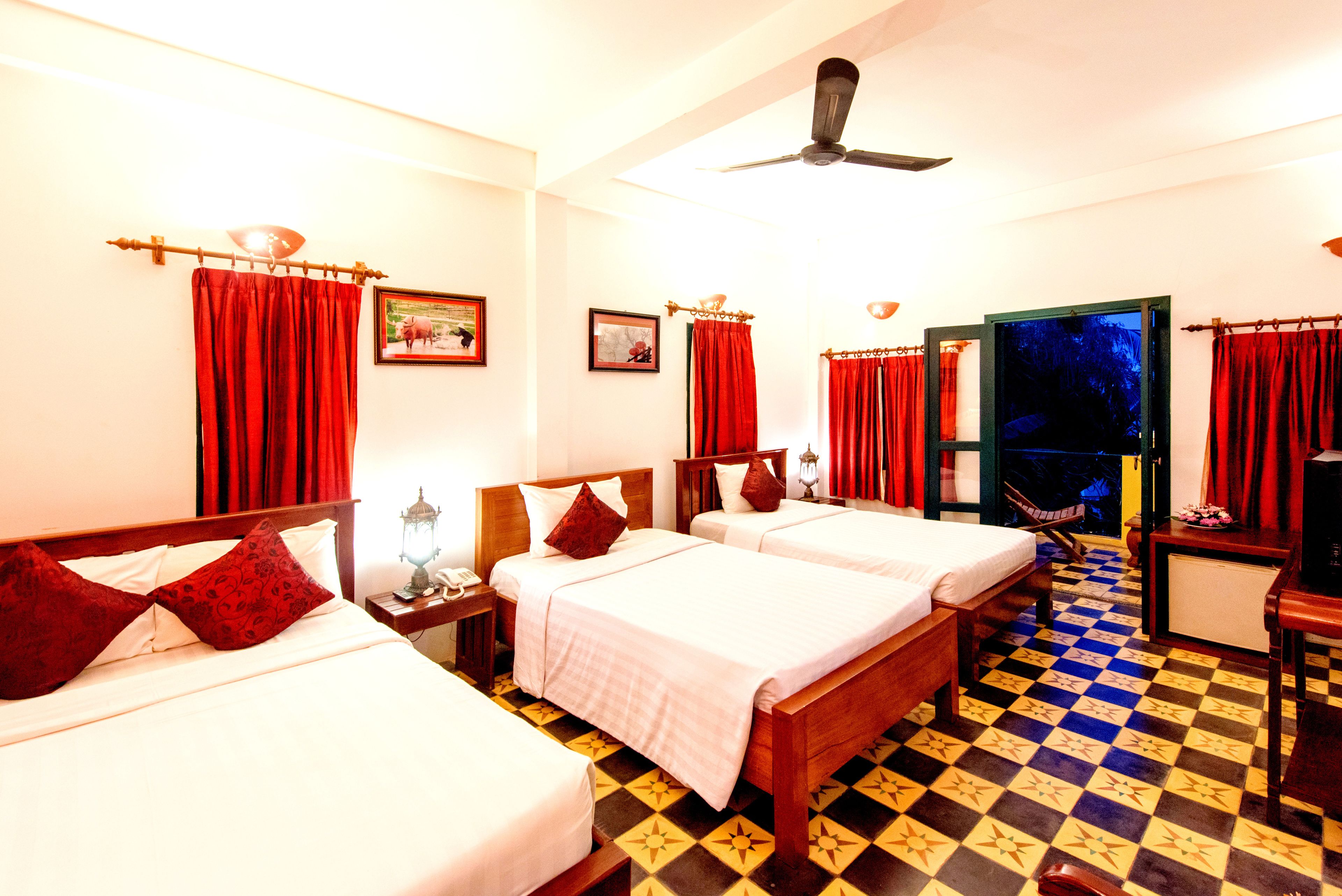 superior triple room, 1 bedroom, garden view, garden area | 1 bedroom, in-room safe, individually decorated, individually furnished