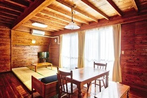 Basic Condo | Living area | Flat-screen TV