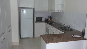 2 Bedroom 2 Bathroom Apartment | Private kitchen | Fridge, microwave, oven, stovetop