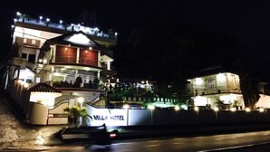 A multi-story hotel with a prominent sign reading "VILLA HOTEL." - Villa Hotel (Trincomalee)