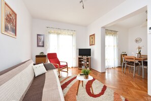 Apartment, 1 Bedroom, Terrace | Living area | Flat-screen TV