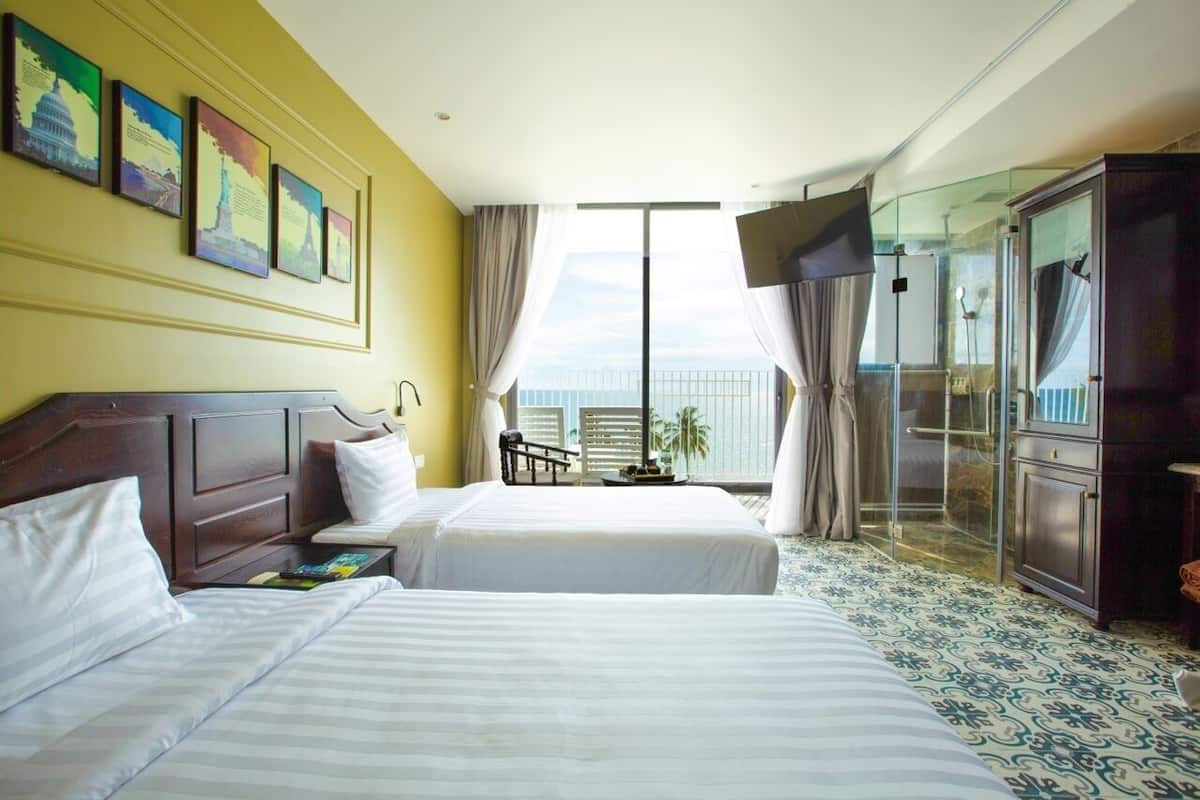 Deluxe Double or Twin Room, Sea View | 2 bedrooms, minibar, in-room safe, desk