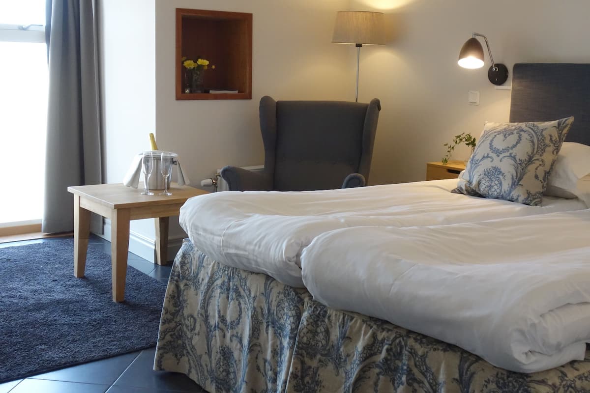 Desk, blackout drapes, iron/ironing board (on request), WiFi (free)