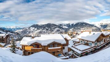 Luxe beddengoed, een kluis op de kamer, een strijkplank/strijkijzer