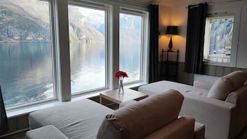Krossen apt 1.First floor 2 bedrooms, Fjord View | Living area | 32-inch flat-screen TV with cable channels, TV