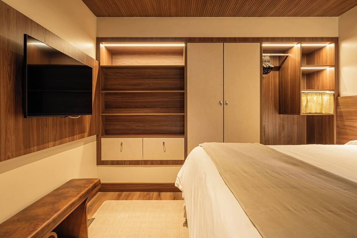 superior suite | minibar, in-room safe, desk, blackout curtains