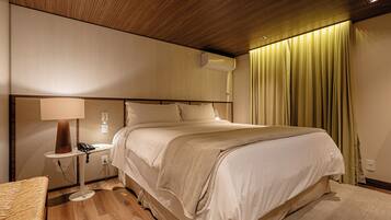 Suíte | Frigobar, cofres nos quartos, escrivaninha, cortinas blackout