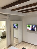 Premium bedding, down comforters, minibar, blackout drapes