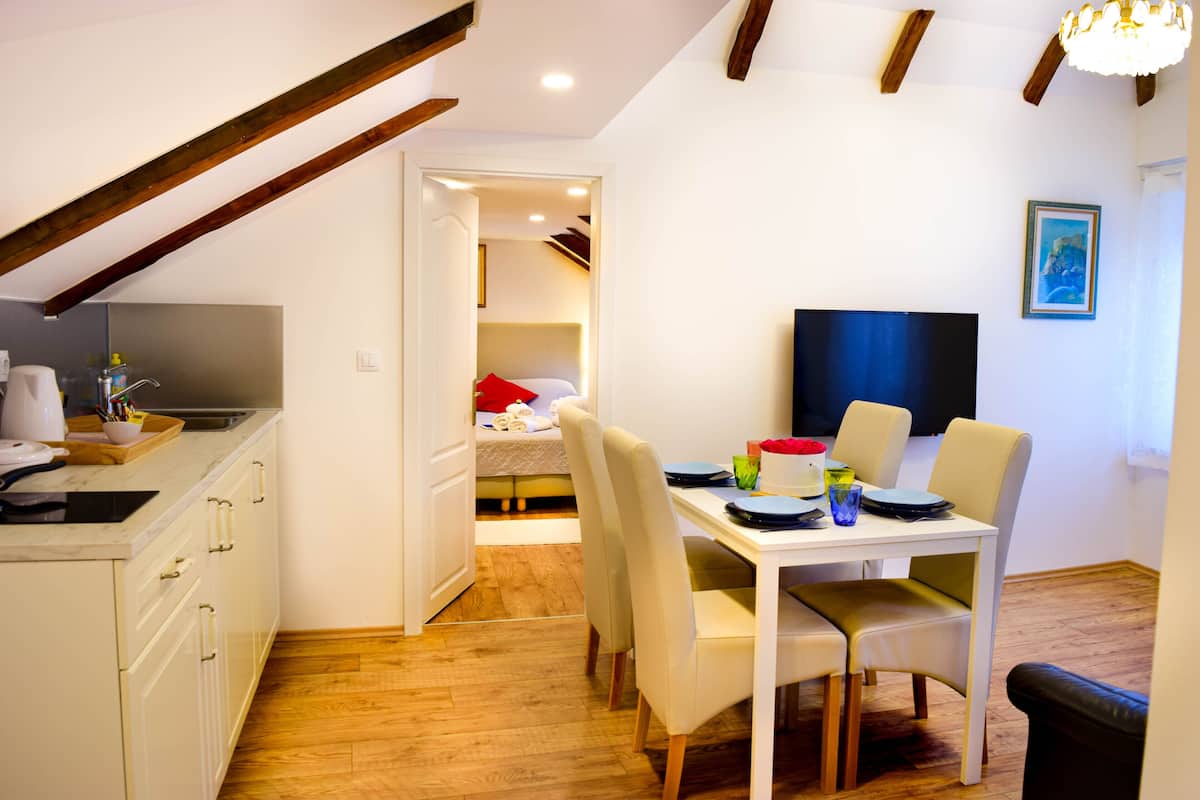 Attic Apartment, 2 Bedrooms, City View | Living area | 40-inch flat-screen TV with satellite channels, TV