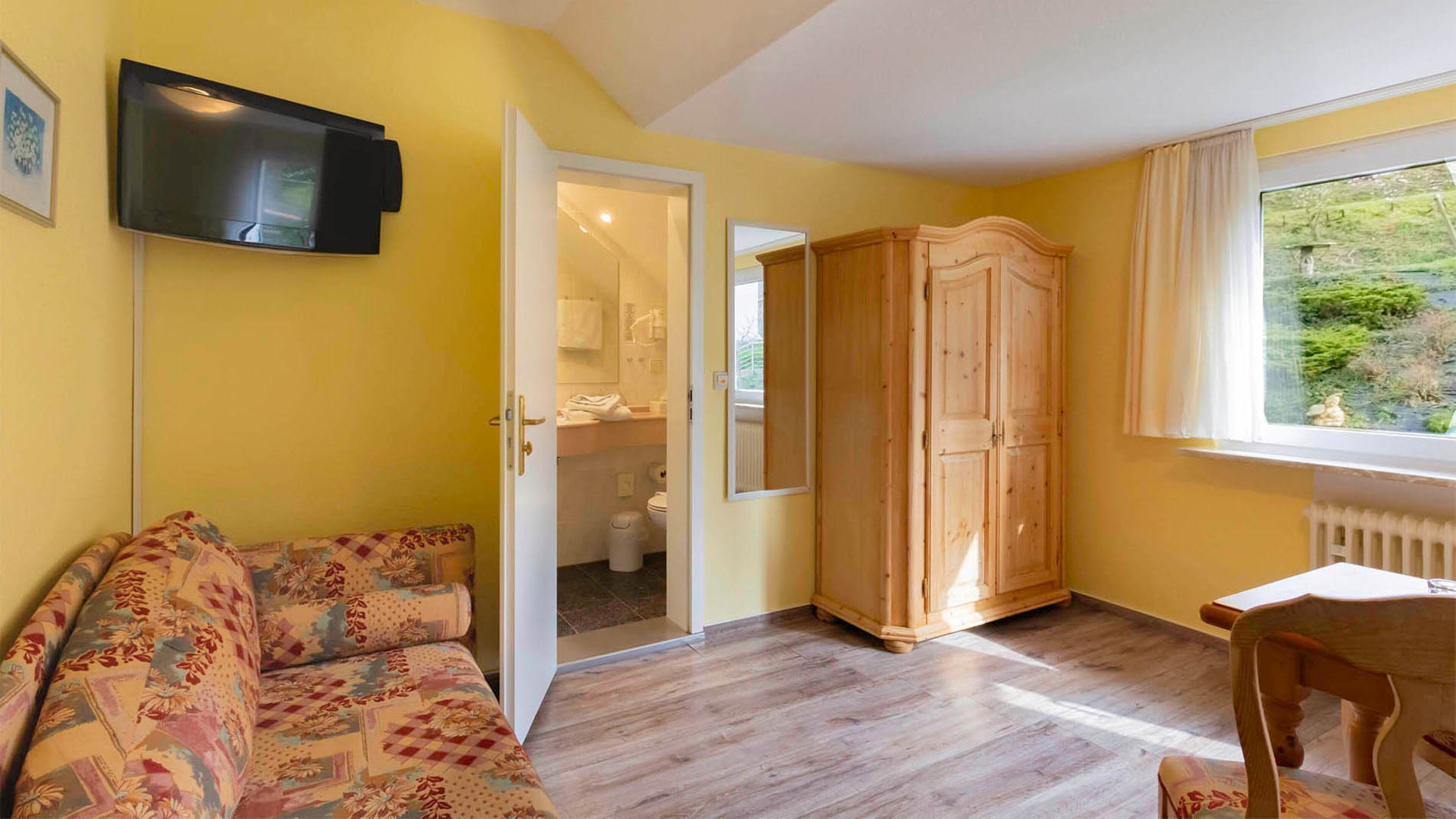 comfort triple room, 1 queen bed with sofa bed, non smoking, slope side | 1 bedroom, hypo-allergenic bedding, soundproofing, travel cot