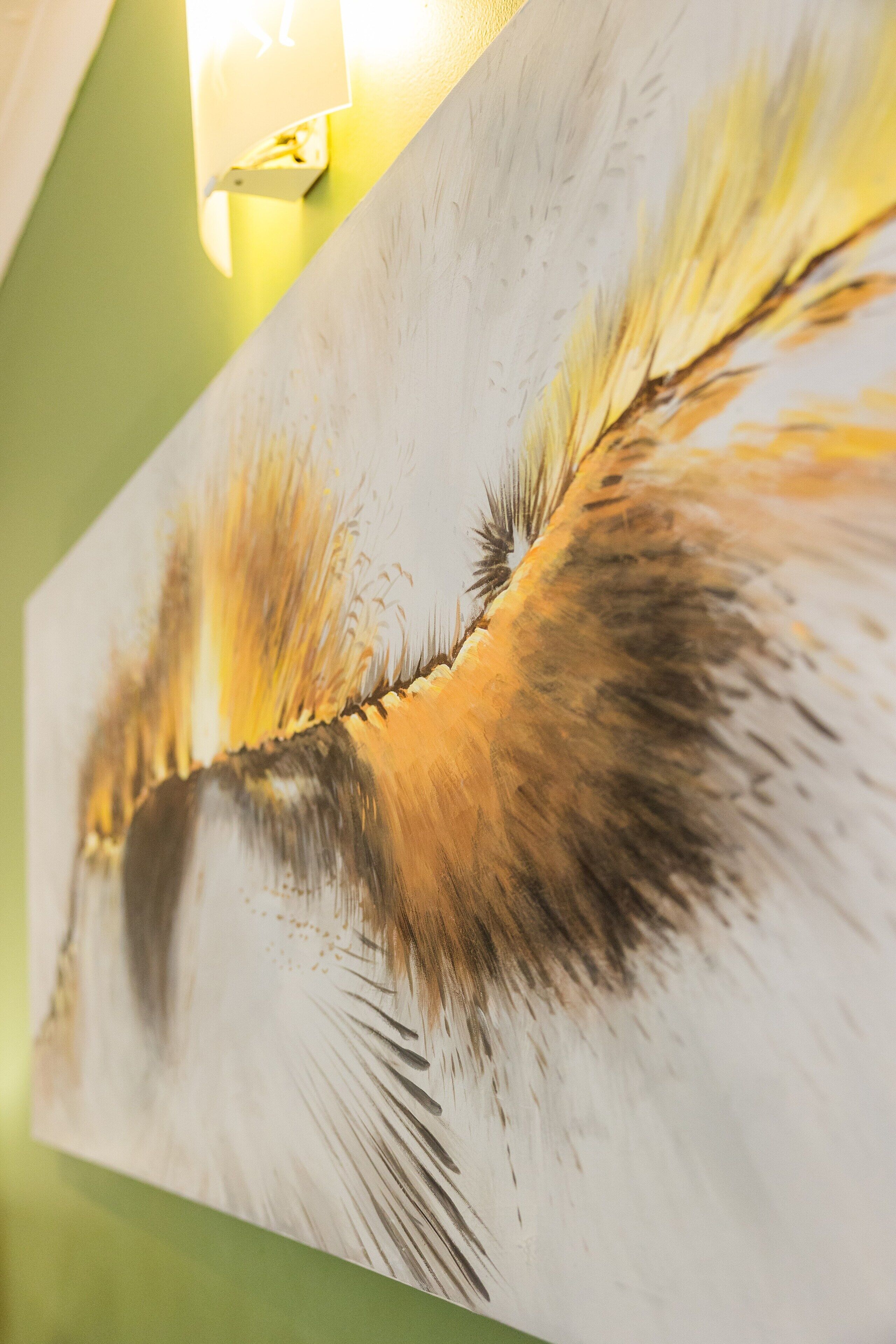 A close-up of a textured wall with a light fixture.