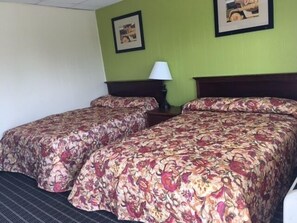 Standard Room, 1 King Bed, Non Smoking | Desk, iron/ironing board, bed sheets