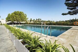 Outdoor pool, pool umbrellas, pool loungers