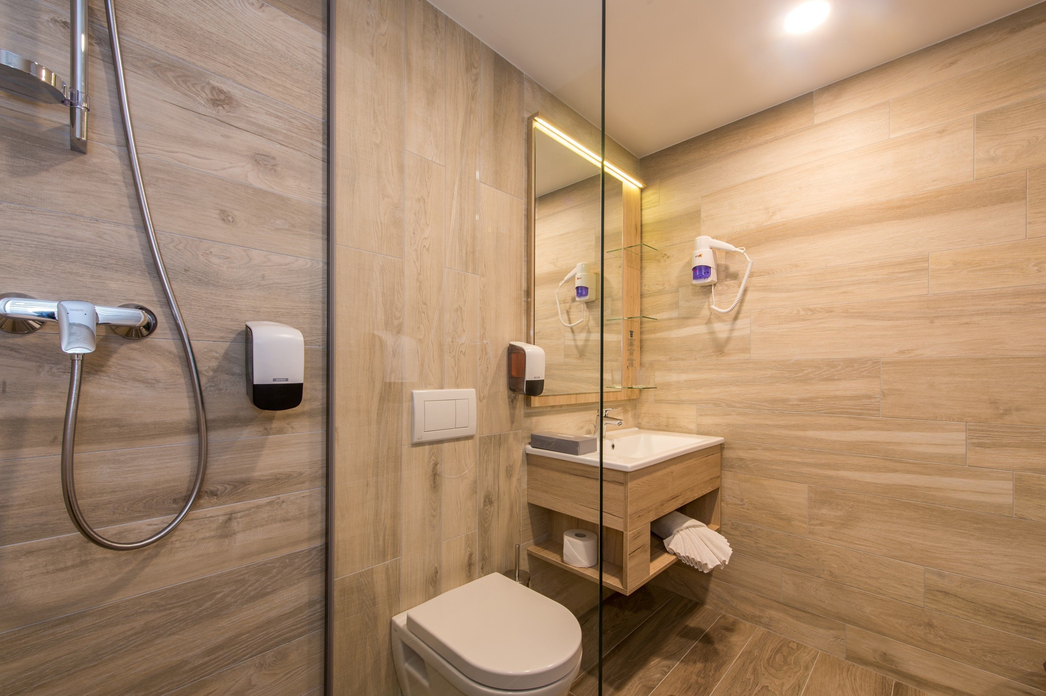 shower, free toiletries, hair dryer, bathrobes