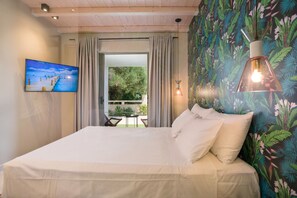 Premium dubbelrum | Minibar, värdeförvaringsskåp på rummet och mörkläggningsgardiner