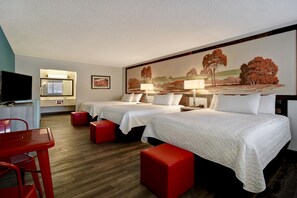 A hotel room with two beds, a TV, a desk, and a painting on the wall. - Expedition Lodge Moab Arches National Park (Moab)