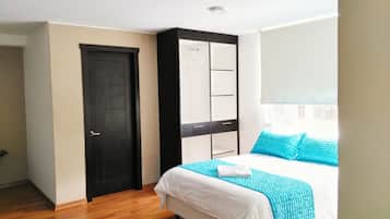 Comfort Triple Room | Minibar, in-room safe, desk, iron/ironing board