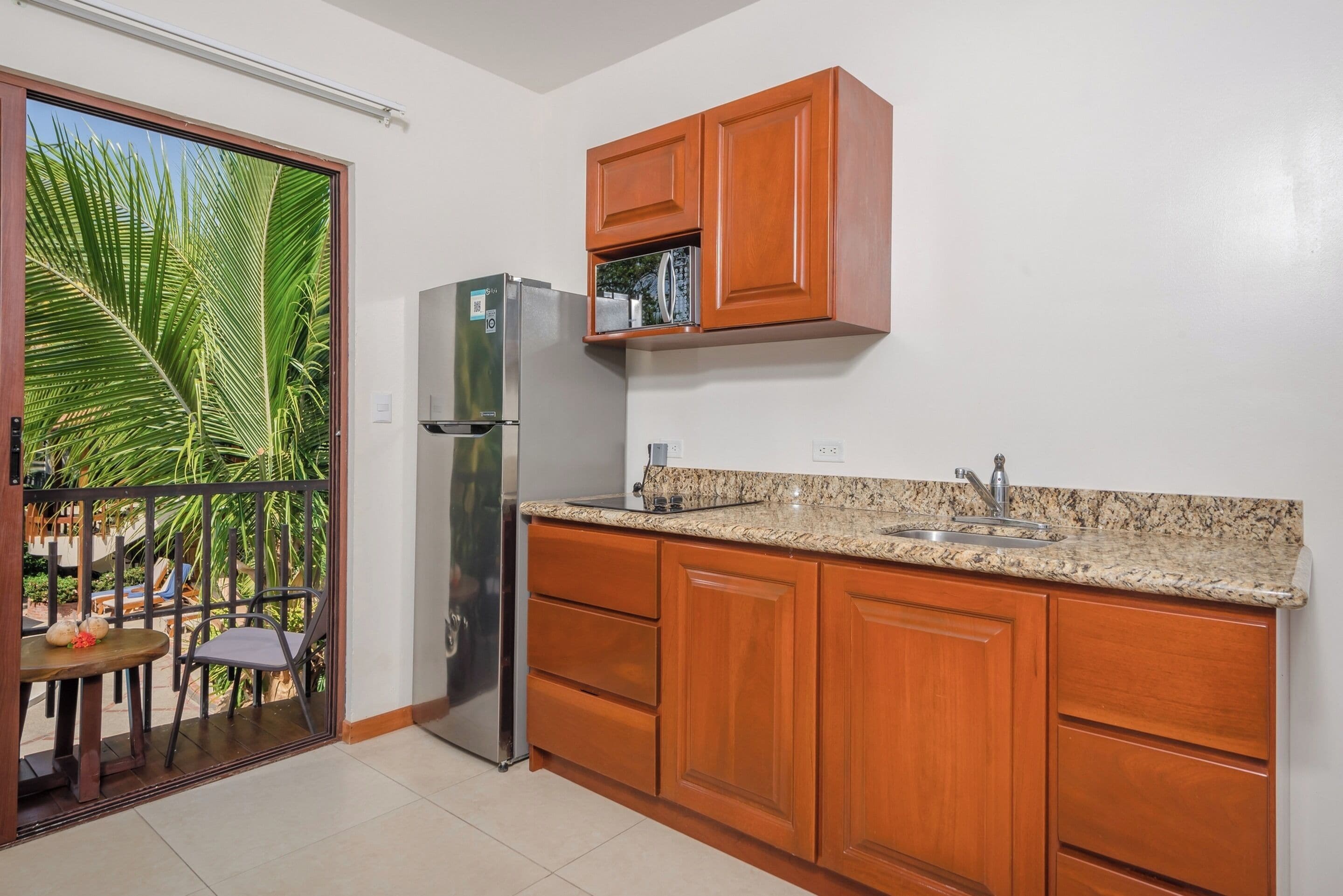 junior suite | private kitchen | full-sized fridge, microwave, stovetop, coffee/tea maker