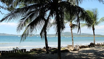 On the beach, sun loungers, beach towels