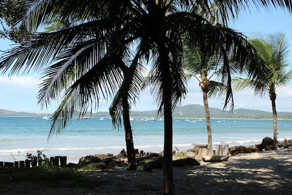 On the beach, sun-loungers, beach towels