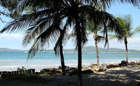 On the beach, sun loungers, beach towels