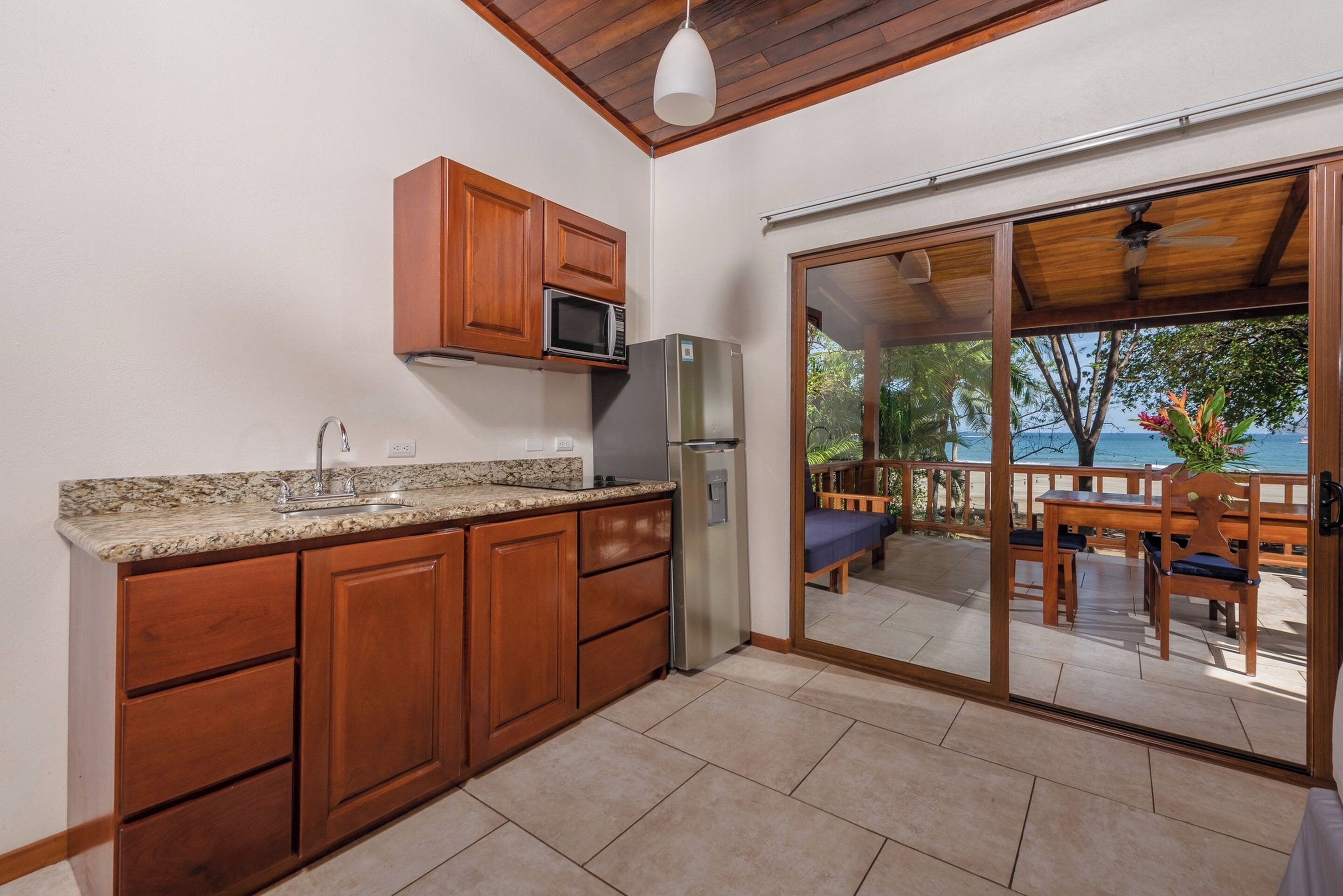 suite, beachfront (plus) | private kitchen | full-sized fridge, microwave, stovetop, coffee/tea maker